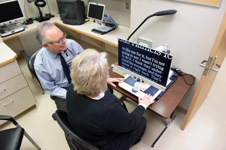 Dr. Mark Wilkinson with patient