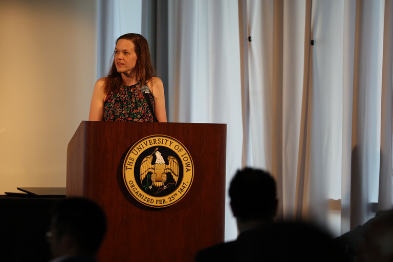 Dr. Lindsay De Andrade speaking at resident and fellow graduation